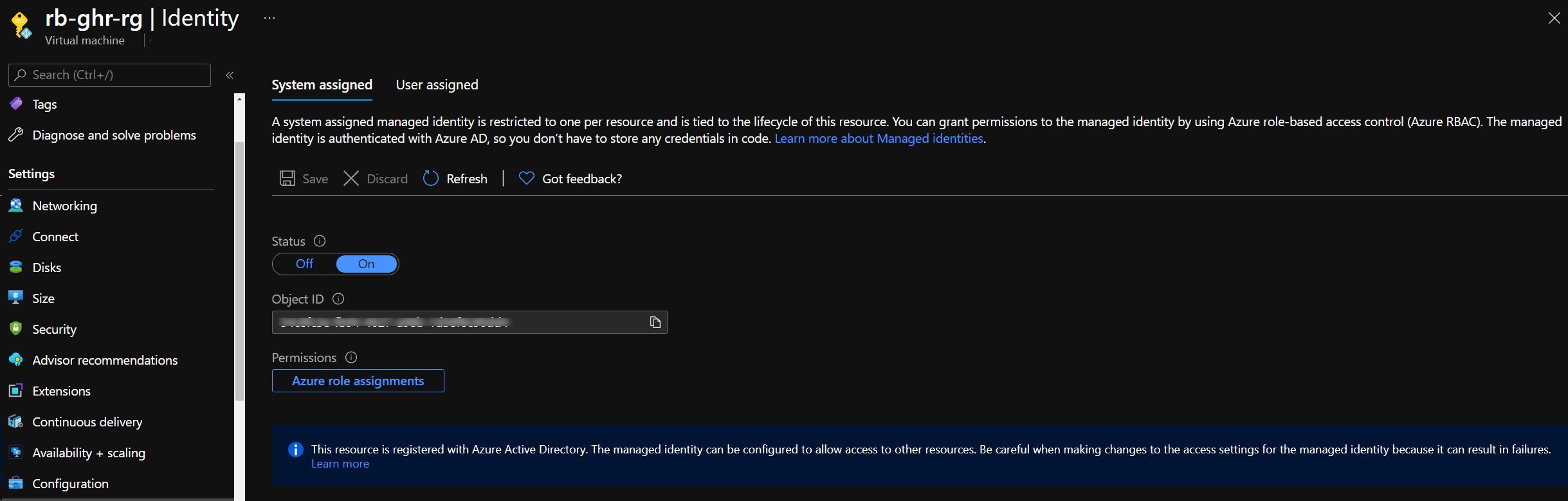 Screenshot showing the configuration of a System Assigned Identity in the Azure VM Resource in Azure Portal Screenshot showing the configuration of a System Assigned Identity in the Azure VM Resource in Azure Portal